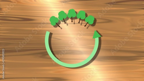 Video animation of an arrow and trees on a wooden background - Environmental and conservation responsibilty, forests, recycling and ecology photo