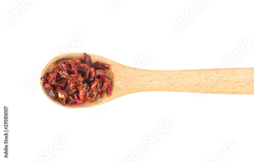 Dry red pepper in spoon