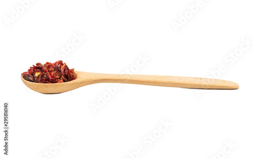 Dry red pepper in spoon
