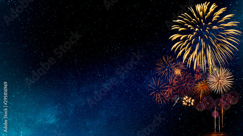 Fireworks with blur milky way background photo