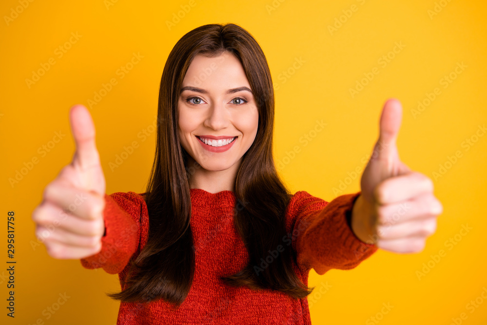 POrtrait of positive cheerful lady show double thumb up give her feedback about excellent sales discounts wear red sweater isolated over yellow color background POrtrait of positive cheerful lady show double thumb up give her feedback about excellent sales discounts wear red sweater isolated over yellow color background