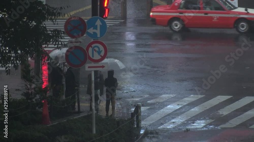 TOKYO,JAPAN - 12 OCTOBER 2019 : Powerful Typhoon Hagibis made landfall. Heaviest rain and winds in 60 years. Government issued highest level of disaster warning. View around Shibuya scramble crossing. photo