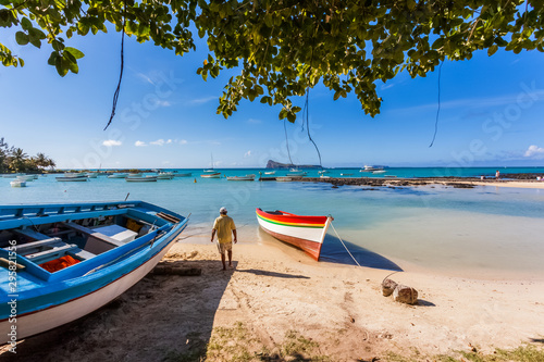 boat on the beach of Cap Malheureux, Mauritius  © Unclesam