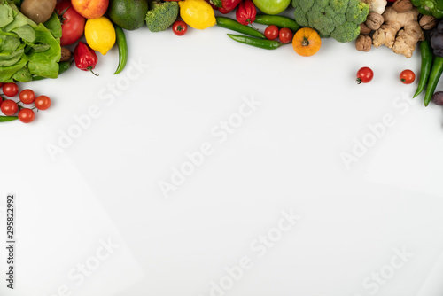 Fitness concept – healthy nutrition and equipment for fitness exercises on the white background.  © zolnierek