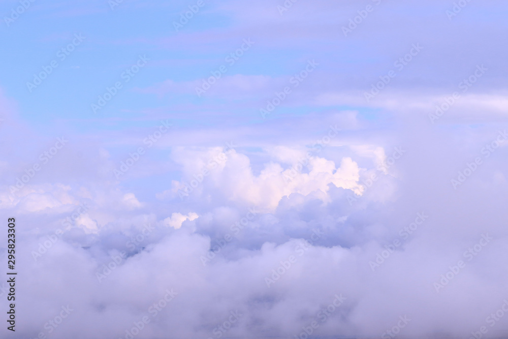 Fototapeta premium Clouds. Big white cumulus clouds on blue sky.