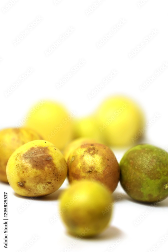 Damaged lemon isolated on a white background Damaged lemon isolated on a white background