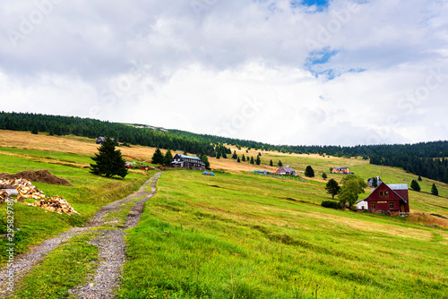 View of hiking trails and Karkonosze (Krkonose) mountains national park at the Poland and Czech Republic border.Scenic summer landscape with beautiful views. Spindlerov Mlyn is a popular tourist place photo