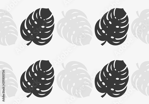 Black and grey monstera leaves seamless wallpaper pattern.