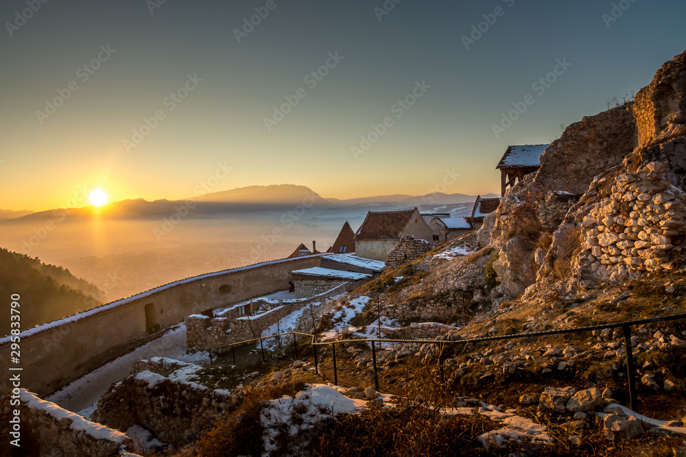 Rasnov fortress Brasov Romania panorama sunset hill on top blue hour