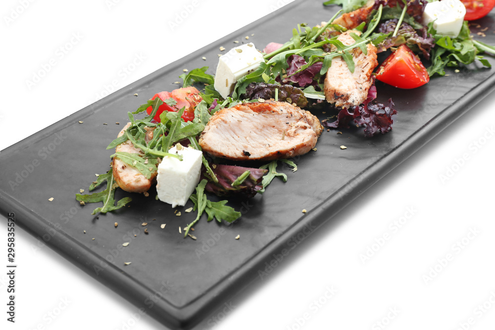 Plate with tasty salad on white background, closeup