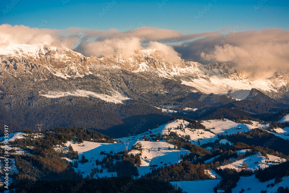 The Carpathians Bucegi Mountains Romania landscape winter snow ice clouds sunlight morning 