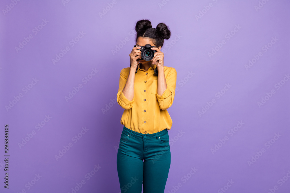 Photo of amazing dark skin lady holding photo digicam in hands photographing foreign sightseeing abroad wear yellow shirt trousers isolated purple color background Photo of amazing dark skin lady holding photo digicam in hands photographing foreign sightseeing abroad wear yellow shirt trousers isolated purple color background