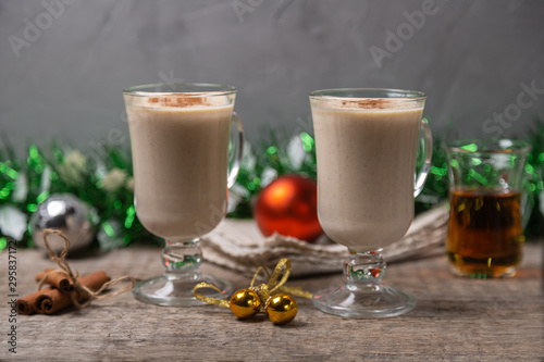 Homemade Christmas drink eggnog with cinnamon prepared for Christmas