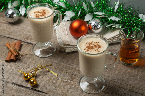 Homemade Christmas drink eggnog with cinnamon prepared for Christmas