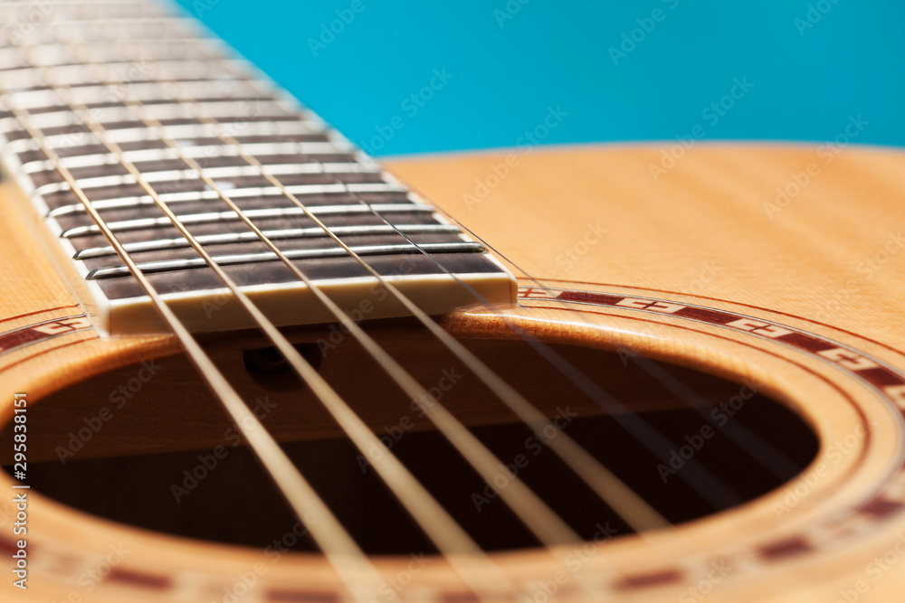 Fototapeta premium Guitar sound hole and strings closeup