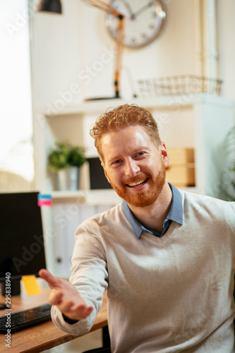 Businessman giving a hand for a handshake. Close up