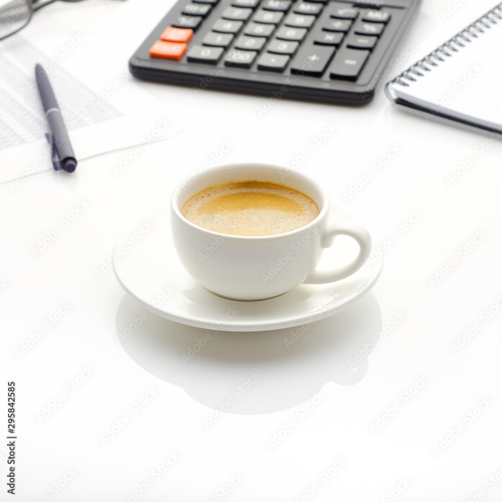 Accounting business concept. Desktop with cup of coffee, calculator, glasses, notepad and spreadsheet. Accounting business concept. Desktop with cup of coffee, calculator, glasses, notepad and spreadsheet.