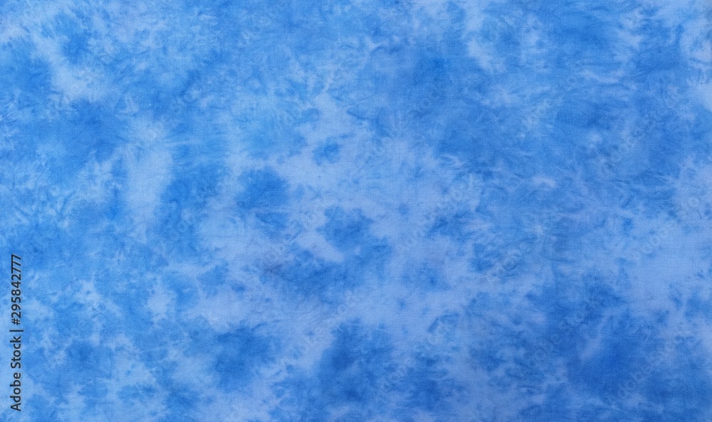 Background of dyed fabric. Beautiful abstract background. Sky, sea, blue background Background of dyed fabric. Beautiful abstract background. Sky, sea, blue background