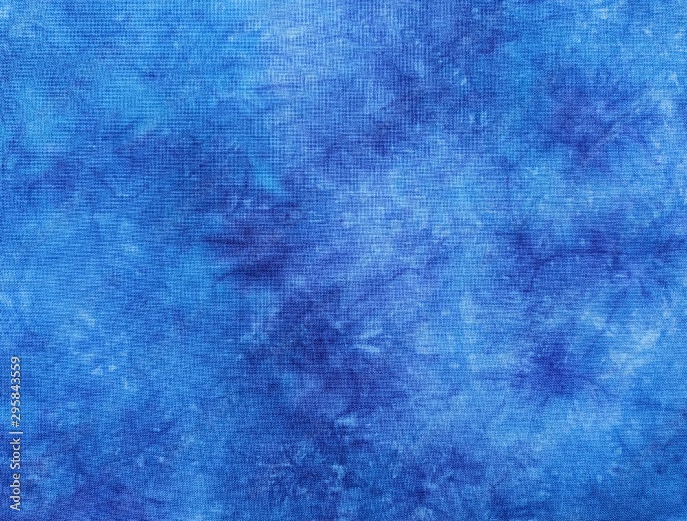 Background of dyed fabric. Beautiful abstract background. Sky, sea, blue background Background of dyed fabric. Beautiful abstract background. Sky, sea, blue background