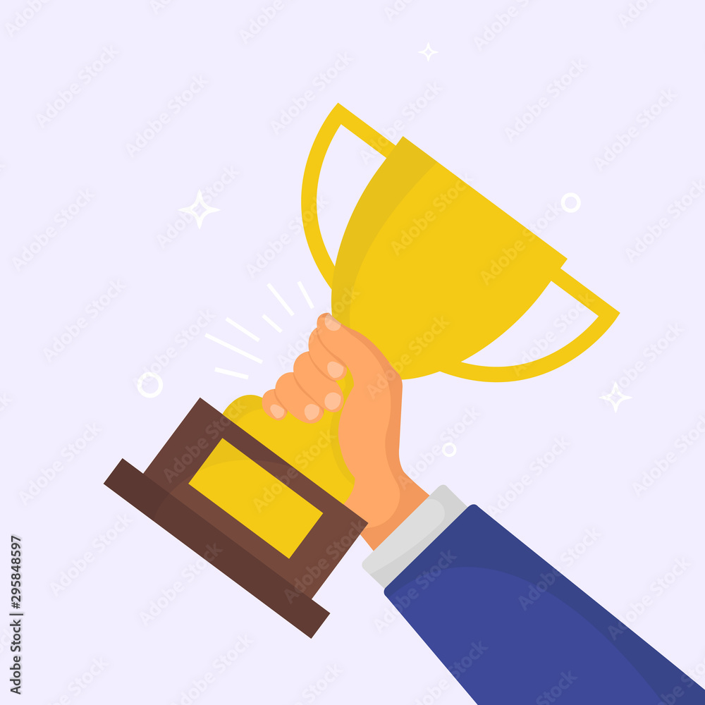 Trophy cup. Man holding a champion golden trophy cup. Human hand ...