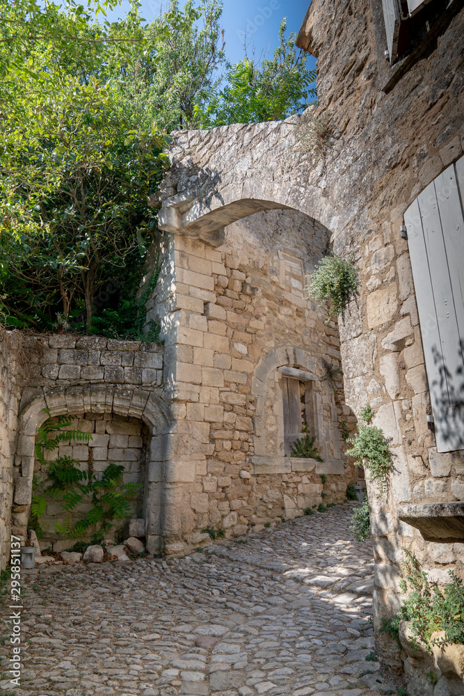 ancient arch in the alleys french village in Provence Oppede le Vieux