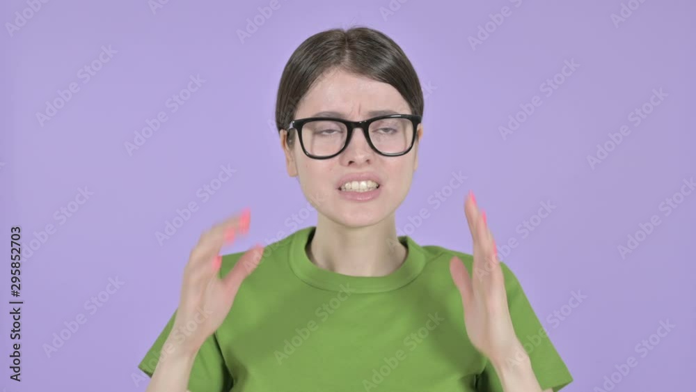 Angry Young Woman Screaming Loud on Pink Background Angry Young Woman Screaming Loud on Pink Background