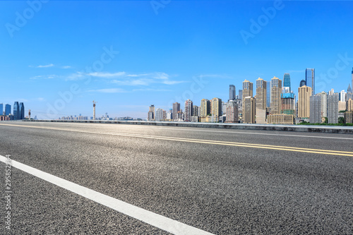 Empty asphalt highway and modern city financial district in chongqing China.