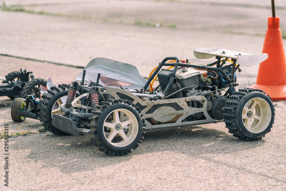Disassembled RC model racing cars. Model cars without top Disassembled RC model racing cars. Model cars without top