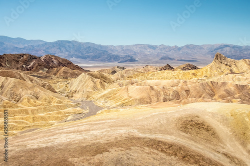 Eroding volcanic ash and silt hills, badlands, at Zabriskie Point, Death Valley National Park, California, USA