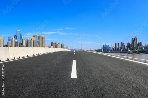 Empty asphalt highway and modern city financial district in chongqing,China. © ABCDstock