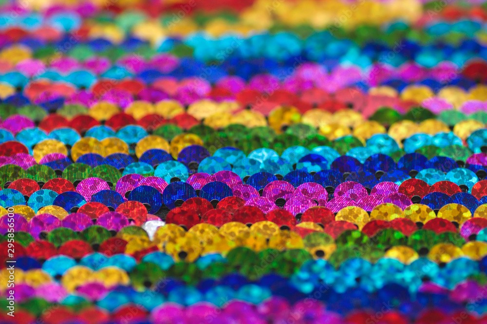 Colorful striped sequins fabric close up