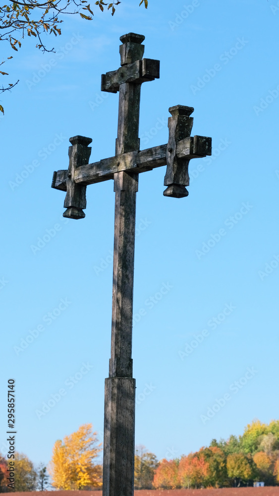 Old wooden christian roadside cross