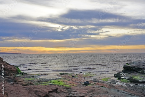 View of Burntcoat Head Park, a red rock park on the Bay of Fundy with the largest tides in the world photo