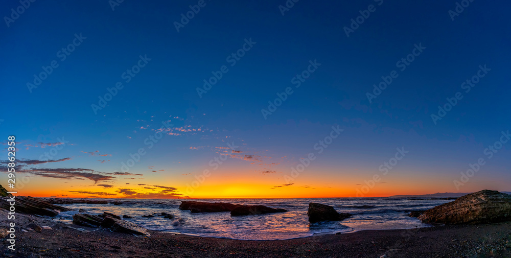 Panorama of Sunset at the Rocky Beach
