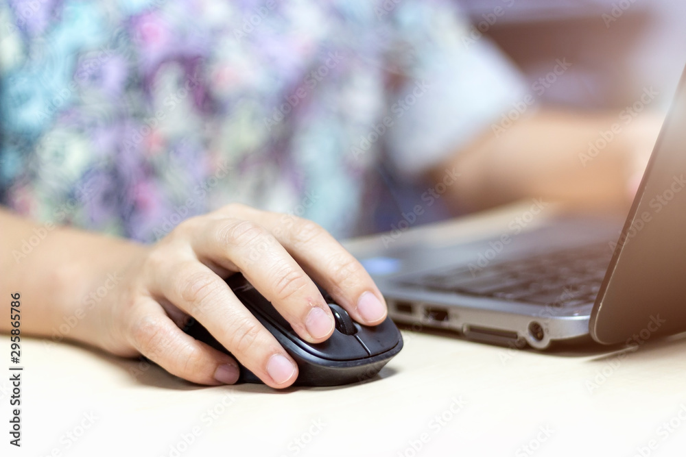 Closeup hand using computer laptop. Using online connect technology for business, education and communication. Closeup hand using computer laptop. Using online connect technology for business, education and communication.