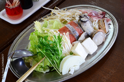 Hotpot cuisine with pork, fish, tofu and vegetable.