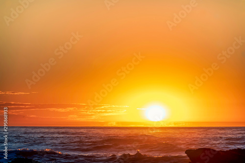 Fototapeta Naklejka Na Ścianę i Meble -  Orange Sunset over Ocean, Horizon