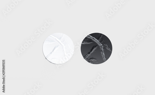 Blank black and white round adhesive sticker mockup isolated photo