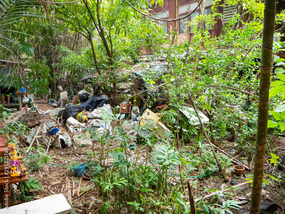 Midden in market behind is wood home,Tree is surround,At market Bangkachao Bangkok Thailand