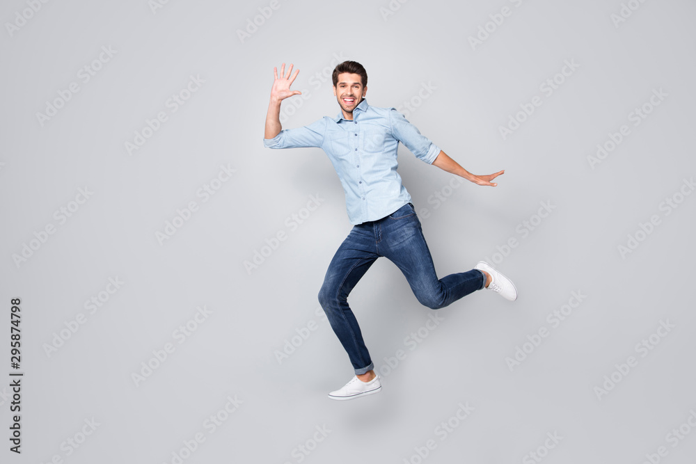 Full length body size profile side photo of cheerful excited nice guy wearing footwear aspiring to coming for sales on time isolated over grey color background