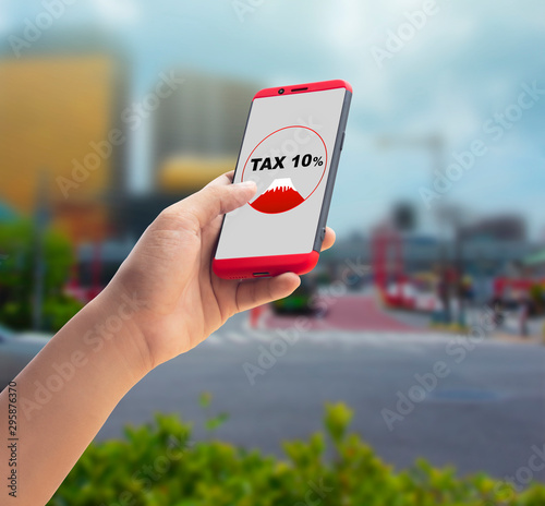 Mobile phones and messages Concept Tax or VAT 10 percent. of Japan