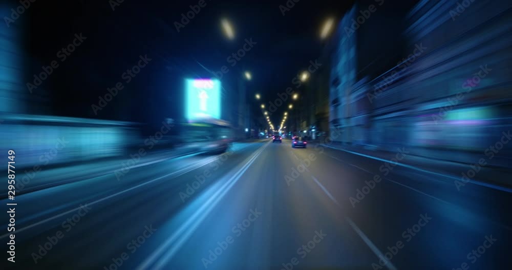 4K - Night city center traffic. Fast driving timelapse