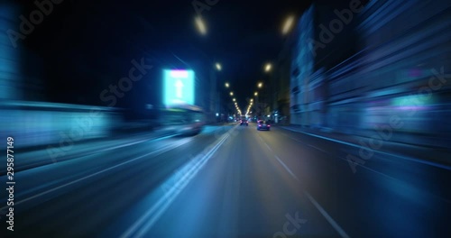 4K - Night city center traffic. Fast driving timelapse