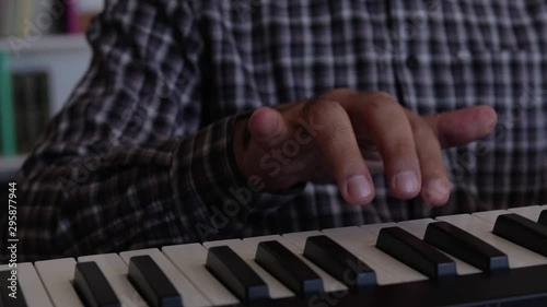Beginner playing keyboard. Learning piano.