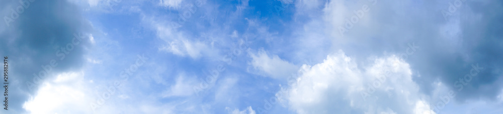 Panorama of Large white clouds in the blue sky