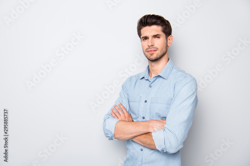 Turned photo of focused business man manager cross his hands ready to solve work problems in company wear casual style outfit isolated over grey color background © deagreez