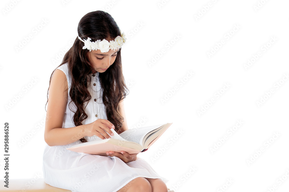 Little girl with a book.Isolated over white background Little girl with a book.Isolated over white background