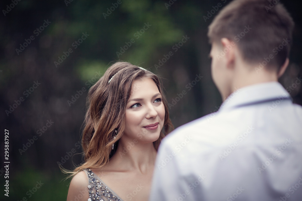 Two lovers in the forest. Photoshoot in the rainy forest Two lovers in the forest. Photoshoot in the rainy forest