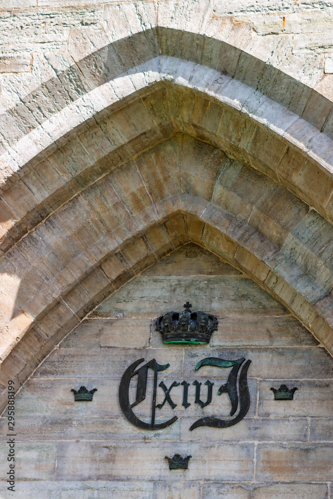 Obraz premium Karl xiv johan monogram on a wall, an old Swedish king