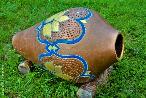 an old clay pot on the grass